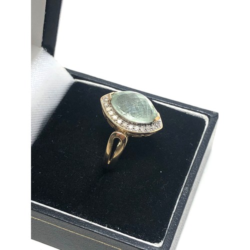 231 - 9ct gold diamond and prasiolite halo ring (3.4g)