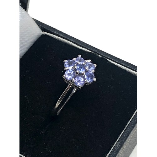 185 - 9ct white gold tanzanite floral cluster ring (1.8g)