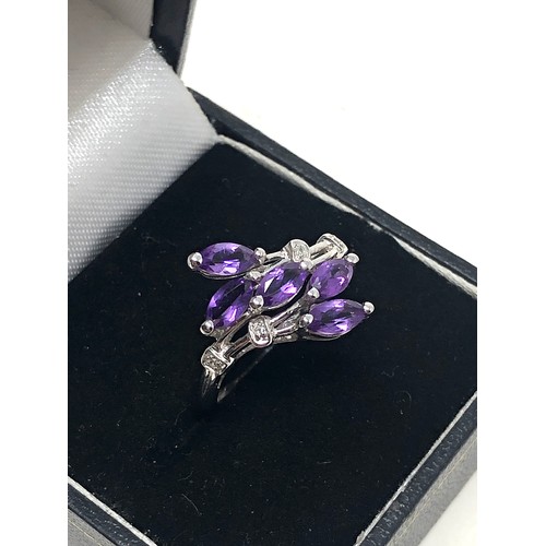 173 - 9ct white gold amethyst & diamond stylised floral dress ring (2.7g)