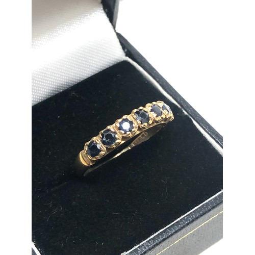 178 - 9ct gold sapphire gypsy setting ring (2.3g)