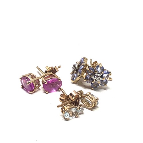 166 - 3 x 9ct paired gemstone stud earrings inc. ruby, tanzanite, diamond & white gemstone (2.5g)