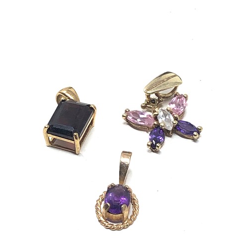 228 - 3 x 9ct gold gemstone set pendants inc. garnet, amethyst & clear gemstone (2.1g)