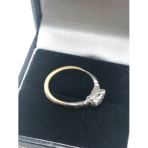 198 - 18ct gold diamond trilogy twist setting ring (3g)