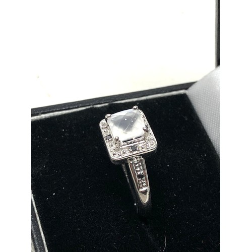 197 - 9ct white gold diamond & quartz ring (3.3g)