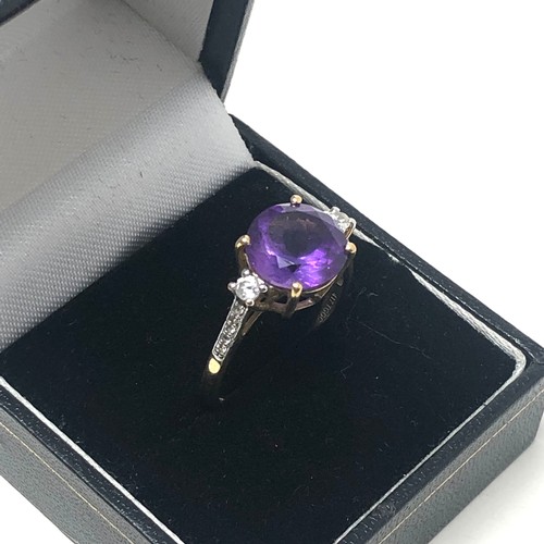 218 - 9ct gold amethyst & clear gemstone statement ring (3g)