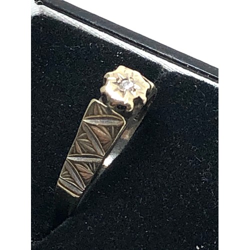 145 - 9ct gold diamond ring (2.7g)