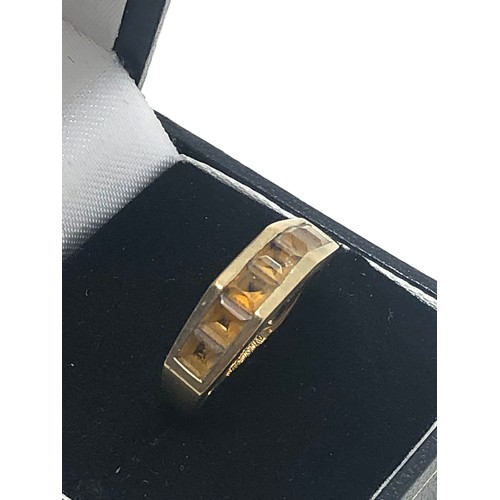 140 - 9ct gold vintage citrine channel setting half-eternity ring (3.2g)