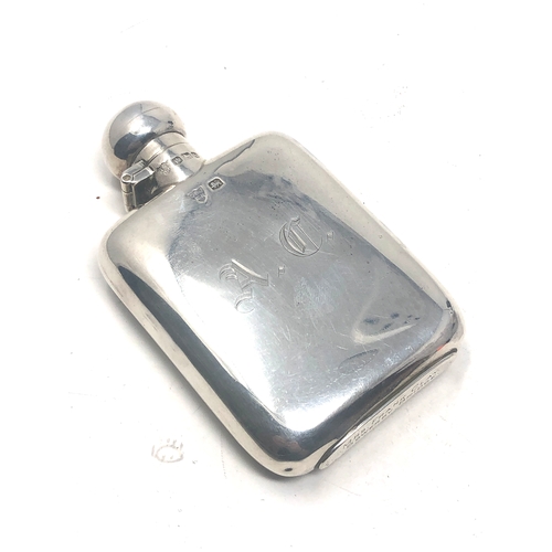 43 - small silver hip flask sheffield silver hallmarks measures approx 10cm by 6cm wide