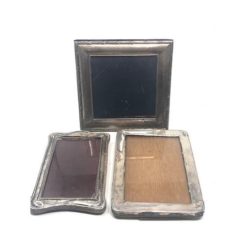 26 - 3 vintage silver picture frames creases and marks  largest measures approx 16.5 by 16.5