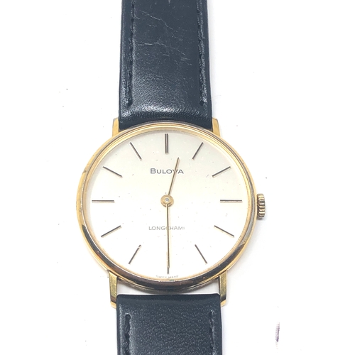 447 - Gents bulova longchamp wristwatch the watch is ticking