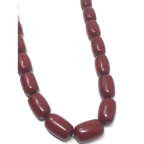 105 - Fine cherry amber bakelite barrel bead necklace large even sized beads with good internal streaking ... 