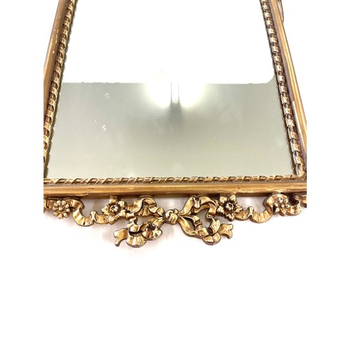 920 - Vintage gilt framed mirror measures approx 34 inches tall 15.5 inches wide