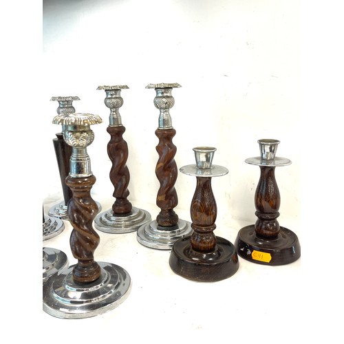 796 - 4 Pairs of vintage wooden and metal candle sticks