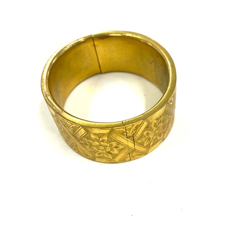 569 - Victorian gilt metal bangle in original fitted case