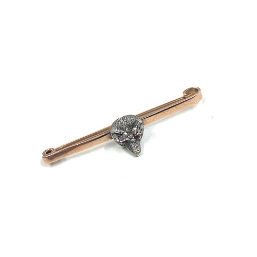 573 - 9ct gold and rose diamond fox brooch