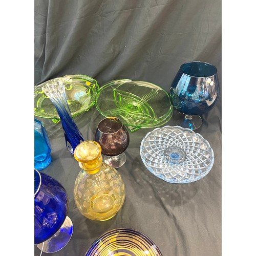 897 - Large selection of coloured glassware includes decanters etc