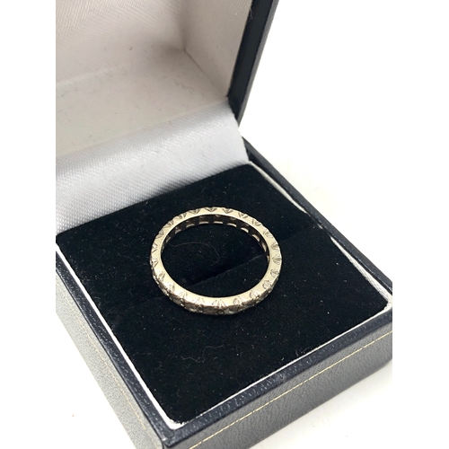 77 - 9ct white gold & syn spinel eternity ring weight 2.1g