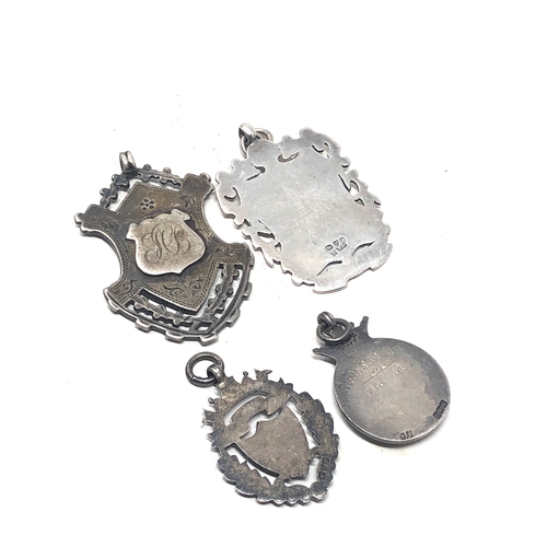 29 - 4 antique silver fobs