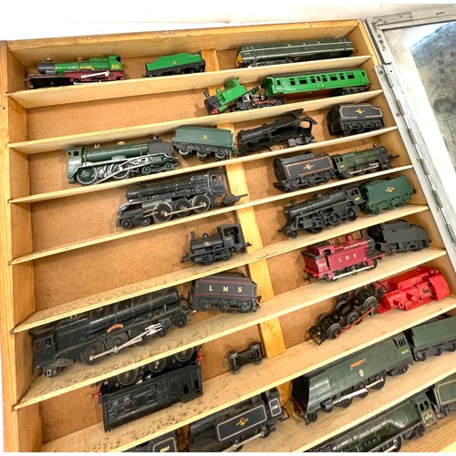 785 - Showcase containing various train engines to include Duchess of Montrose, Victoria, LMS 7606,  Winds... 