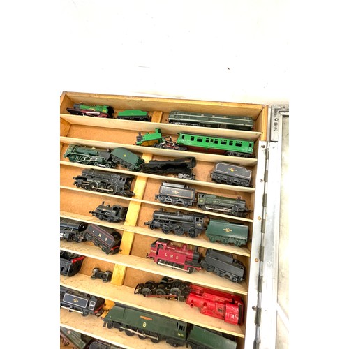 785 - Showcase containing various train engines to include Duchess of Montrose, Victoria, LMS 7606,  Winds... 