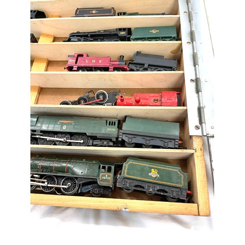 785 - Showcase containing various train engines to include Duchess of Montrose, Victoria, LMS 7606,  Winds... 