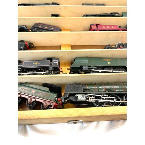 785 - Showcase containing various train engines to include Duchess of Montrose, Victoria, LMS 7606,  Winds... 