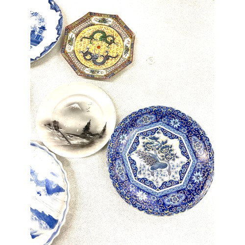 836 - Selection of oriental pottery to include plates, meat plates, blue and white part tea service etc