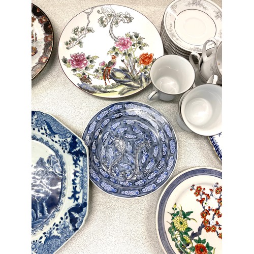 836 - Selection of oriental pottery to include plates, meat plates, blue and white part tea service etc