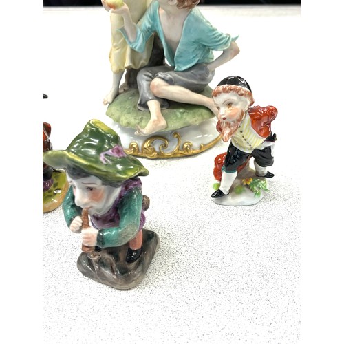 597 - Selection vintage Capodimonte figurines markers mark to base, damage to largest figure (finger)