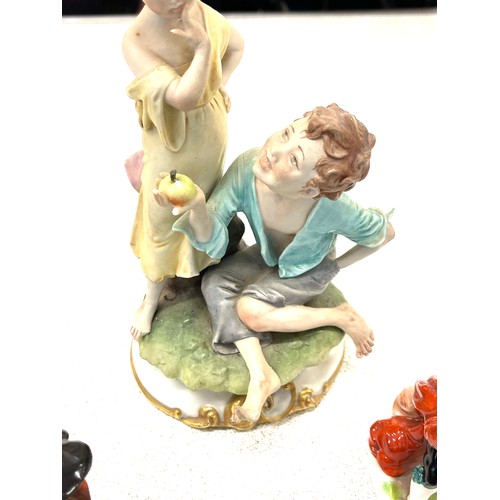 597 - Selection vintage Capodimonte figurines markers mark to base, damage to largest figure (finger)