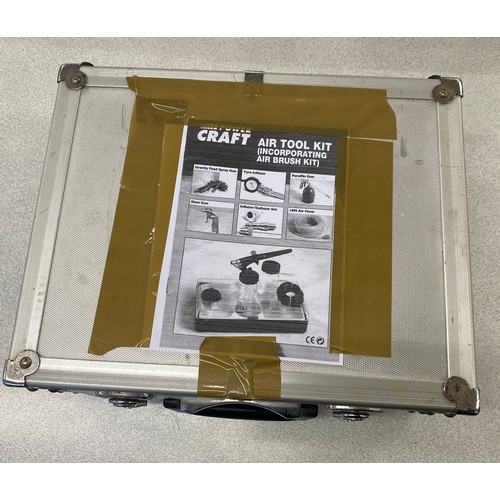 888 - Air tool kit with air brush kit in metal carry case