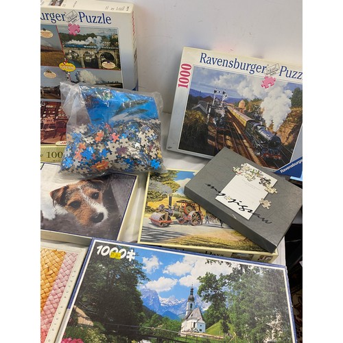 815 - Large selection of assorted puzzles includes Ravensburger, King etc