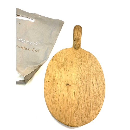 876 - Vintage Mouseman Robert Thompson oak oval cheese board, measures approx 16 inches long by 8.5 inches... 