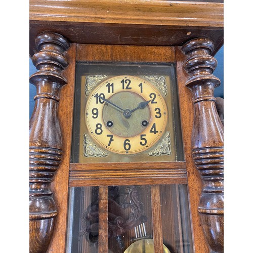 626 - Edwardian 2 key hole wall hanging clock with key and pendulum