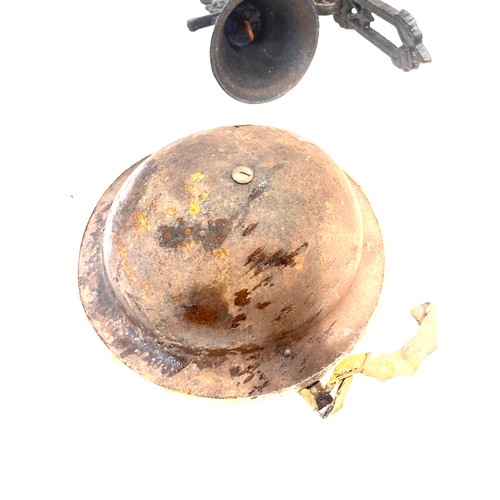 868 - Selection of metal items includes bell, military helmet etc