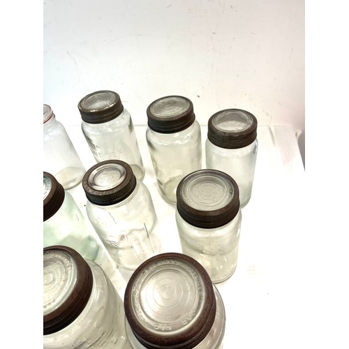 857 - Selection of 11 vintage glass advertising jars to include forester, Kilner etc