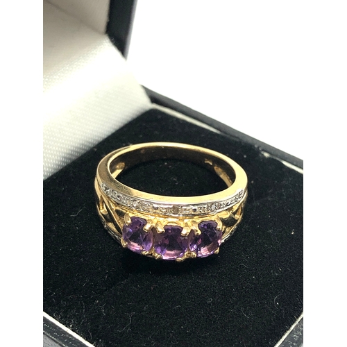 91 - 9ct gold amethyst & diamond ring weight 3.4g