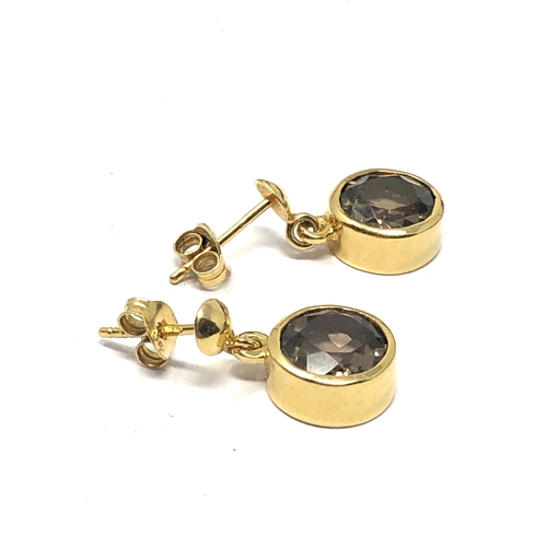 103 - 9ct gold smoky quartz earrings measure approx 1.6cm drop weight 3.1g