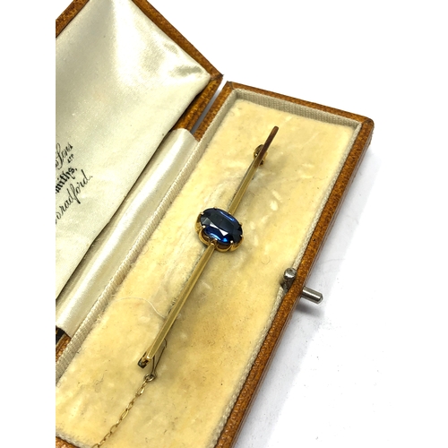 109 - Fine Antique Boxed 18ct gold sapphire pin brooch central sapphire measures approx 9mm by 7mm weight ... 