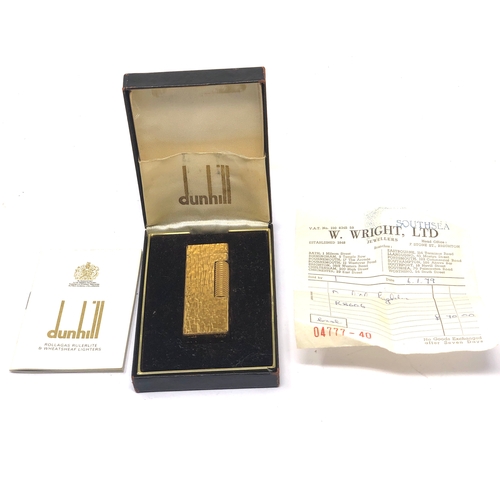 554 - Fine vintage boxed dunhill cigarette lighter good condition with original 1979 receipt