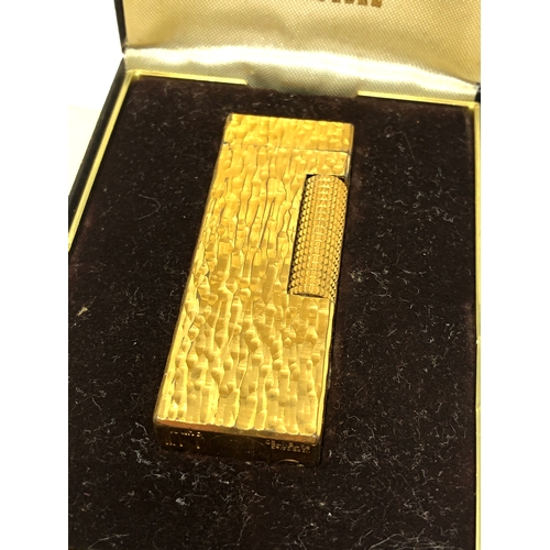 554 - Fine vintage boxed dunhill cigarette lighter good condition with original 1979 receipt