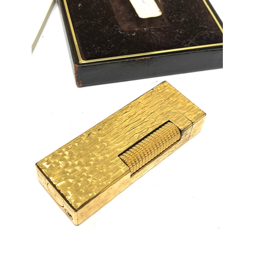 554 - Fine vintage boxed dunhill cigarette lighter good condition with original 1979 receipt