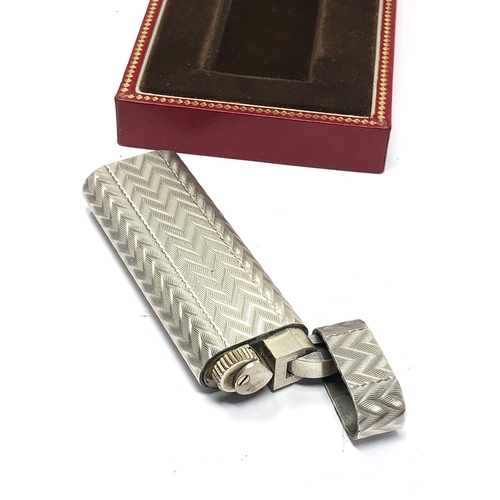 555 - Fine vintage boxed cartier cigarette lighter good condition