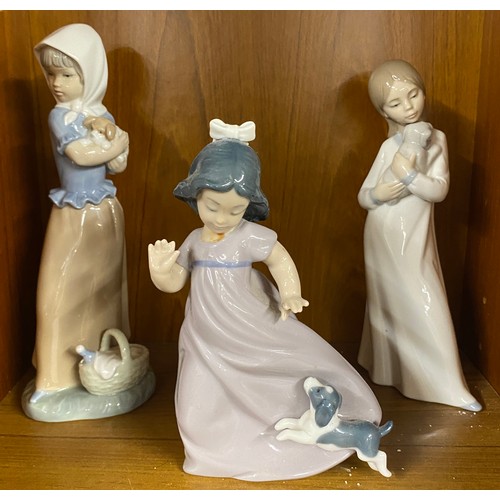 723 - Selection of 3 vintage Nao figures of Girls playing with dogs, tallest measures 8.5 inches tall