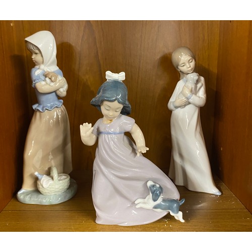 723 - Selection of 3 vintage Nao figures of Girls playing with dogs, tallest measures 8.5 inches tall