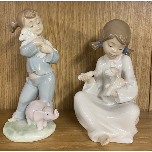 729 - Vintage Nao figure of a girl feeding a lamb and a Nao figure of a girl cuddling a Lamb, tallest meas... 