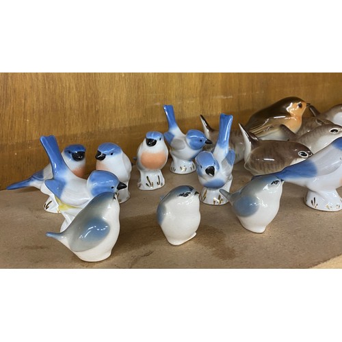 657 - Large Selection of USSR pottery birds includes Wrens etc