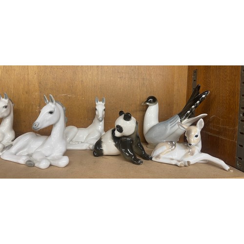 645 - Large selection of USSR pottery animals includes Zebra, Rabbit, Fawn, Rabbits, 3 Horses etc