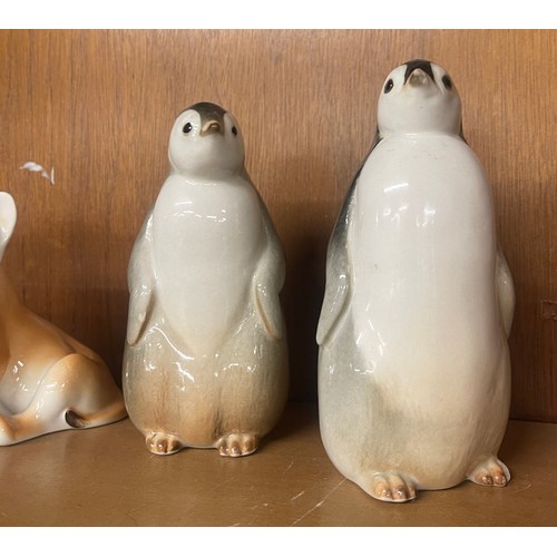 628 - Matching set of USSR cubs and a matching set of USSR Penguins, Chip to one penguins foot.