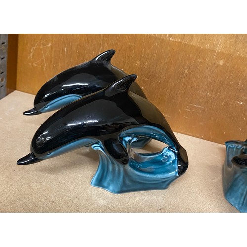 744 - Selection of 6 Poole Pottery swimming Dolphin figures